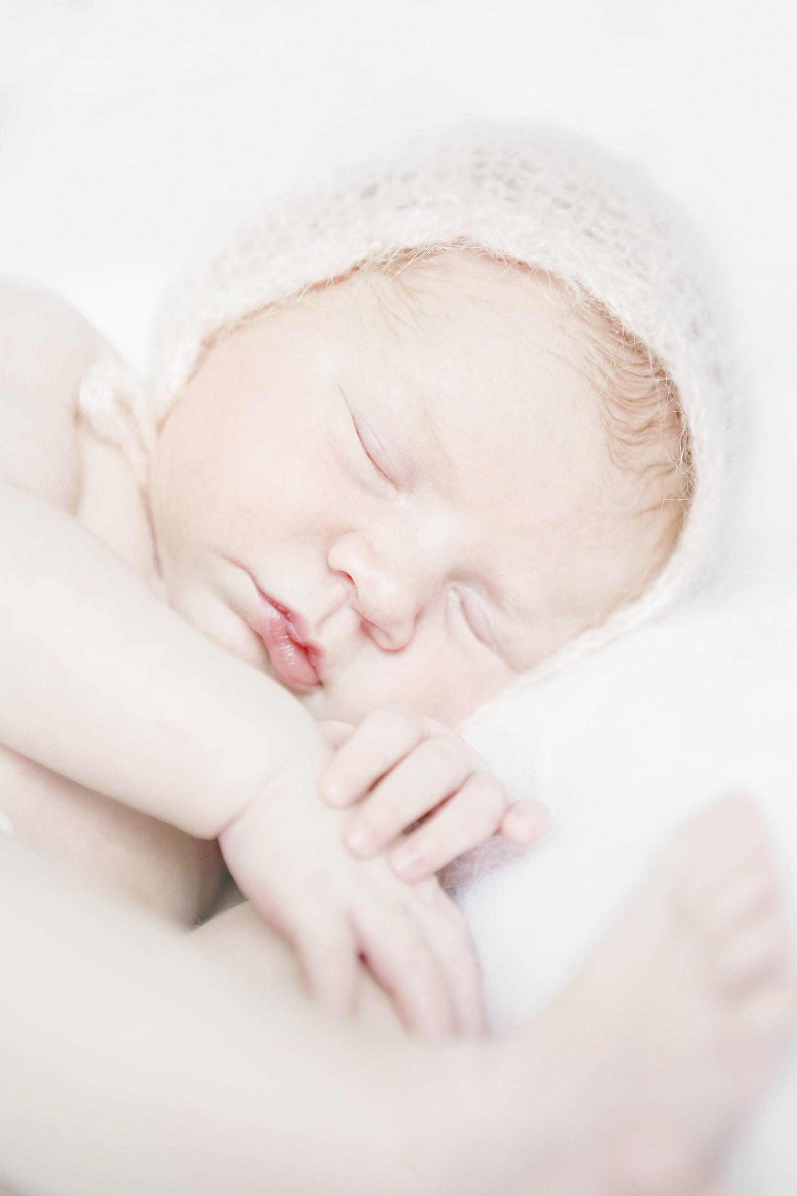 minimal props, bright and airy newborn baby girls photography on white background