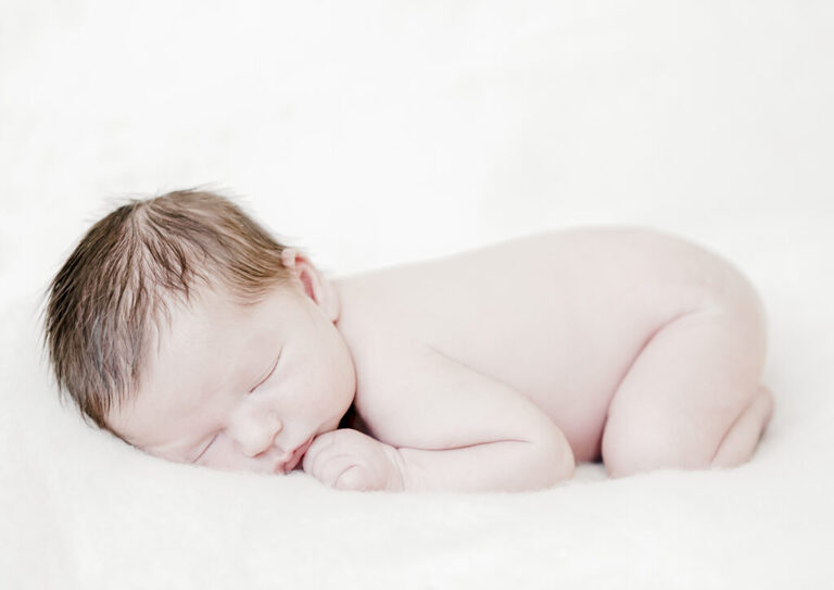 Loughton Newborn Photography_ petite feet photography. Newborn with no props shoot in a home studio in east London, Woodford. Timeless and pure newborn photography.