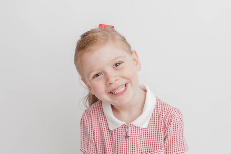 contemporary school portraits London contemporary preschool portrait with white background and natural studio set up by petite feet photography