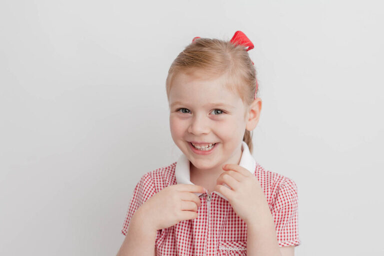 contemporary school photography London, contemporary preschool portrait with white background and natural studio set up by petite feet photography