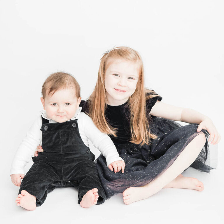 Maternity Photographer Epping.. kids studio photography London with no props, timeless on white background, candid, no pose, no props, timeless, elegant and minimal by petite feet photography Woodford, London. Happy New Year!